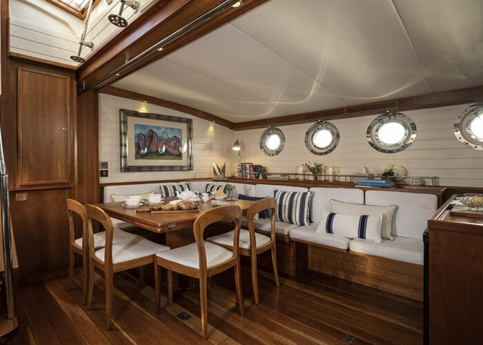 classic sailing yacht alexofloflondon saloon dining.jpg